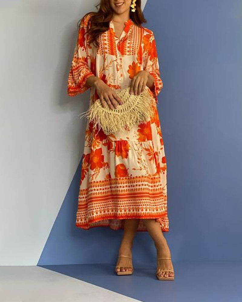 Robe mi-longue orange vif à col en V