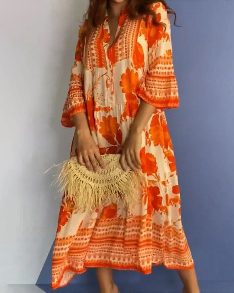 Robe mi-longue orange vif à col en V