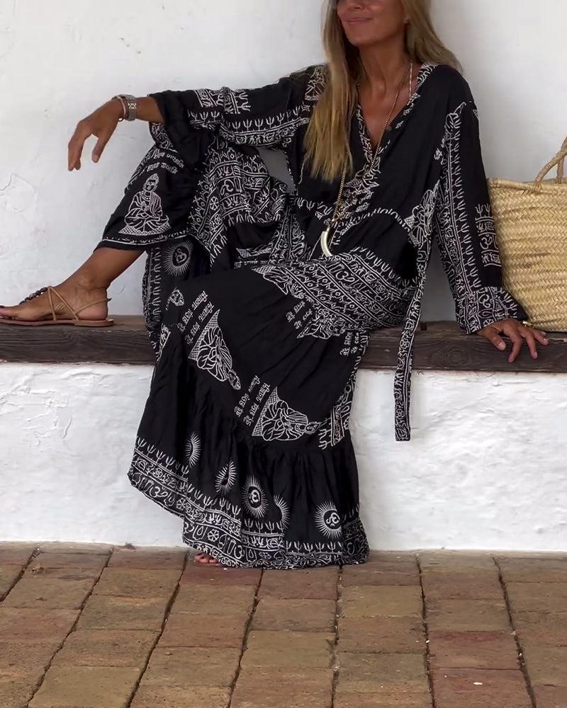 Robe longue tendance à col en V et manches cloche