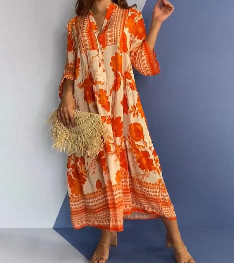 Robe mi-longue orange vif à col en V