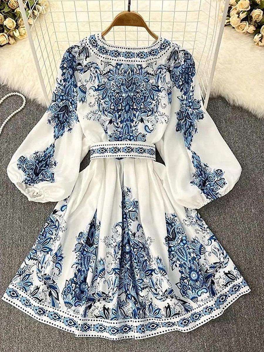Leah Mini-robe aérée à manches longues et col en V
