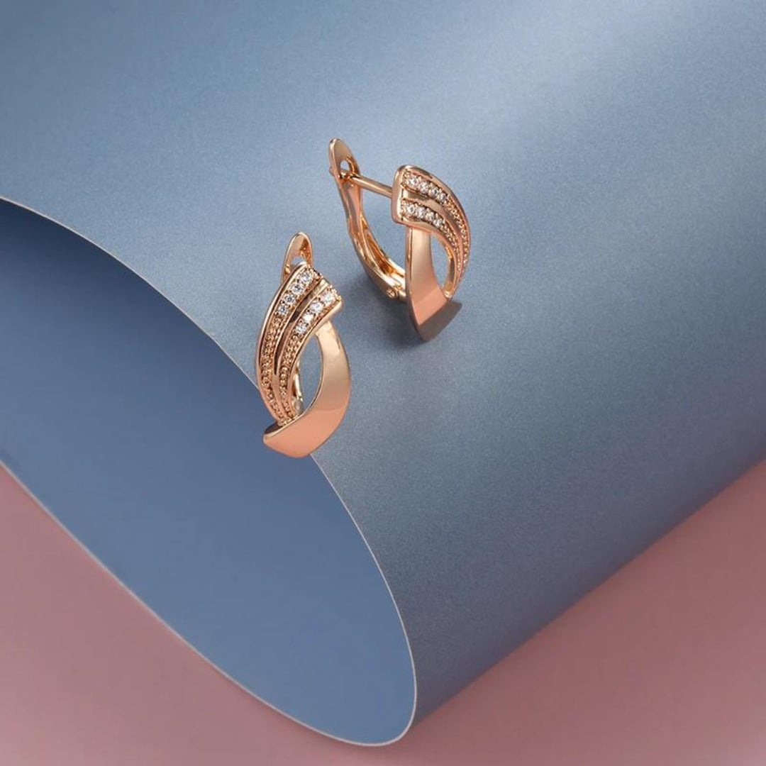 Boucles d'oreilles Paris élégantes en or rose