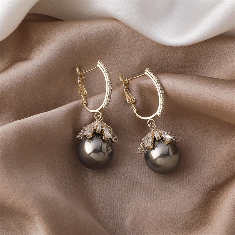 Boucles d'oreilles pendantes Malia avec perle