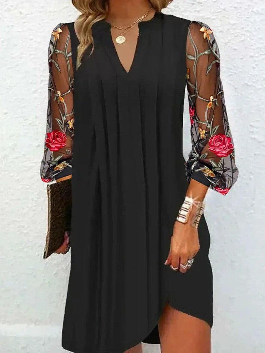 Julia Mini-robe élégante à manches transparentes et col en V