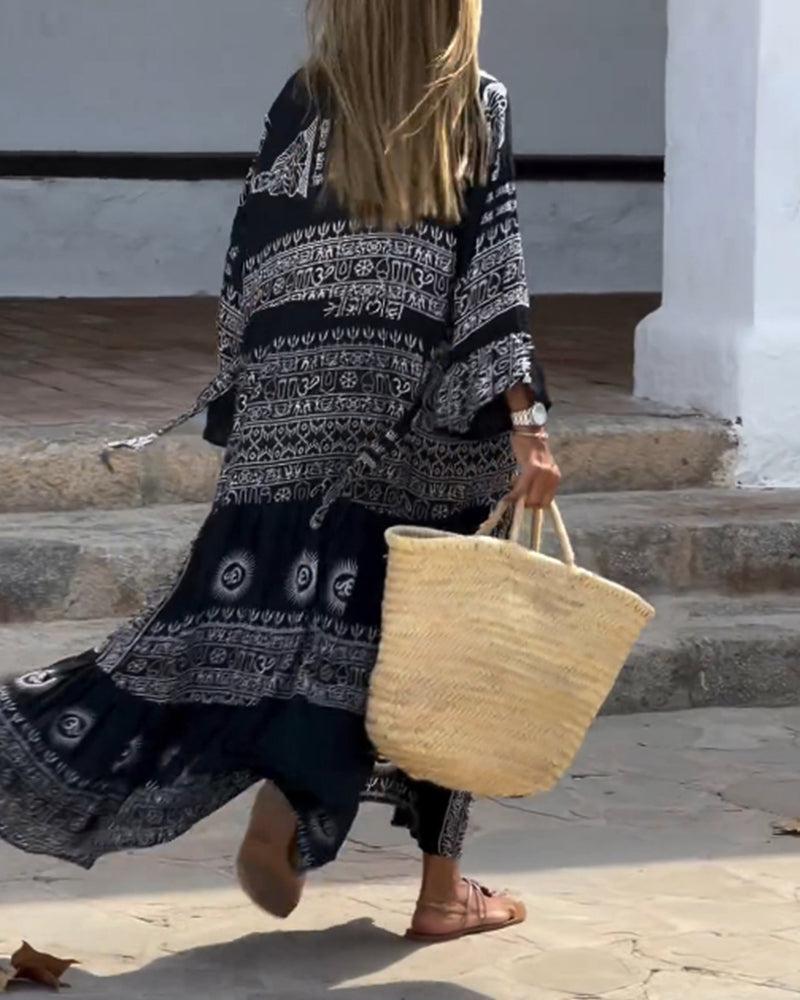 Robe longue tendance à col en V et manches cloche