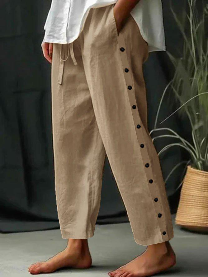 Pantalon marron uni avec poche latérale et cordon de serrage à la taille