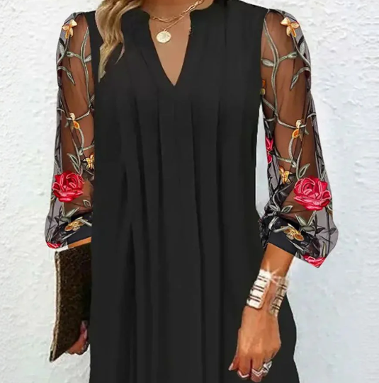 Julia Mini-robe élégante à manches transparentes et col en V