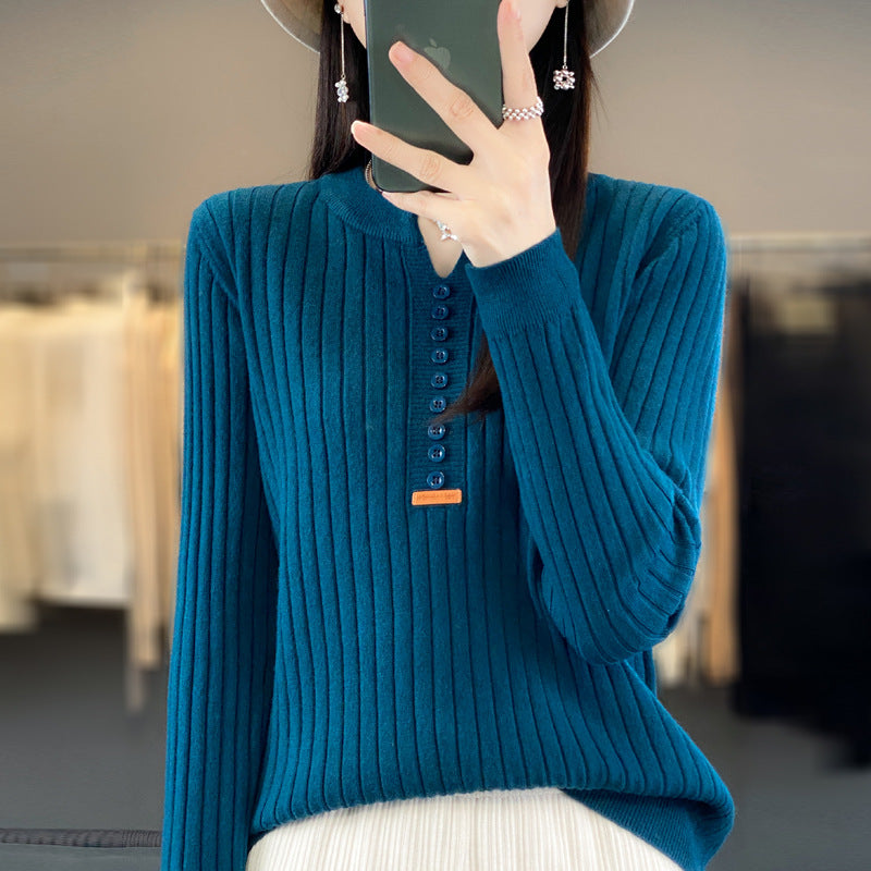 Nettoyer™ | Pull tricoté à col V