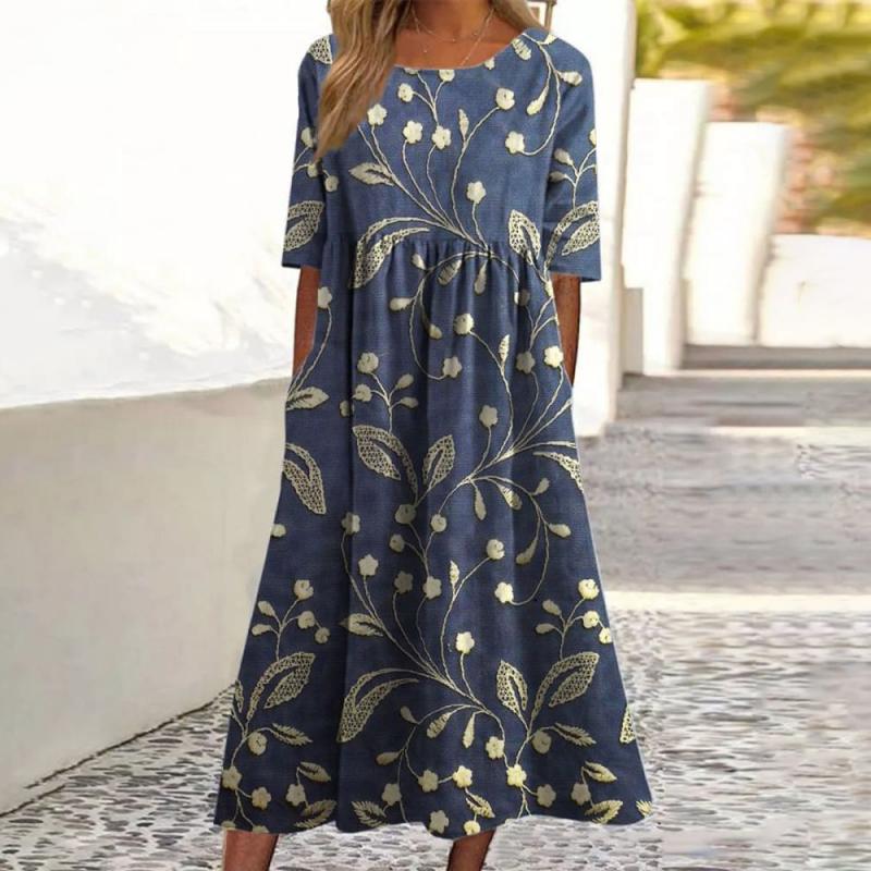 Marguerite | Robe mi-longue brodée de fleurs élégante