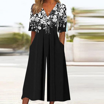 Combinaison noire à manches mi-longues et imprimé floral