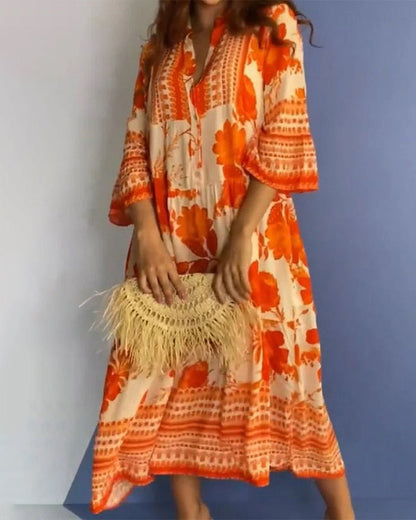 Robe mi-longue orange vif à col en V