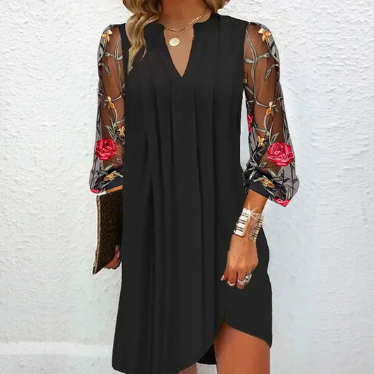 Julia Mini-robe élégante à manches transparentes et col en V