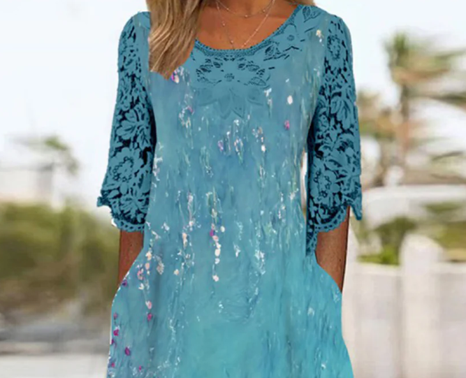 Superbe robe midi bleue à manches mi-longues et poche latérale